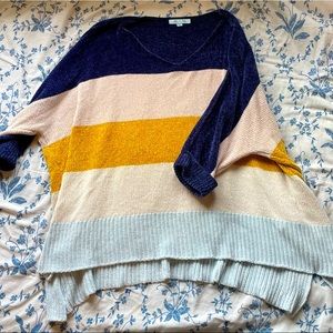 Super cozy, over-sized, quarter-length sleeved top. Lightly warn